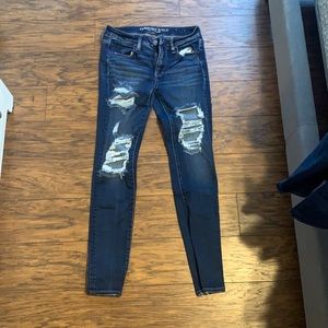 ripped american eagle skinny jeans